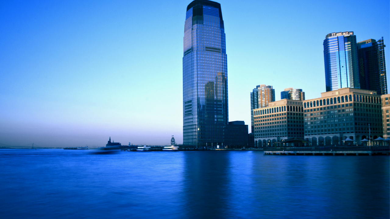 High Rise Building Near Body of Water During Daytime. Wallpaper in 1280x720 Resolution