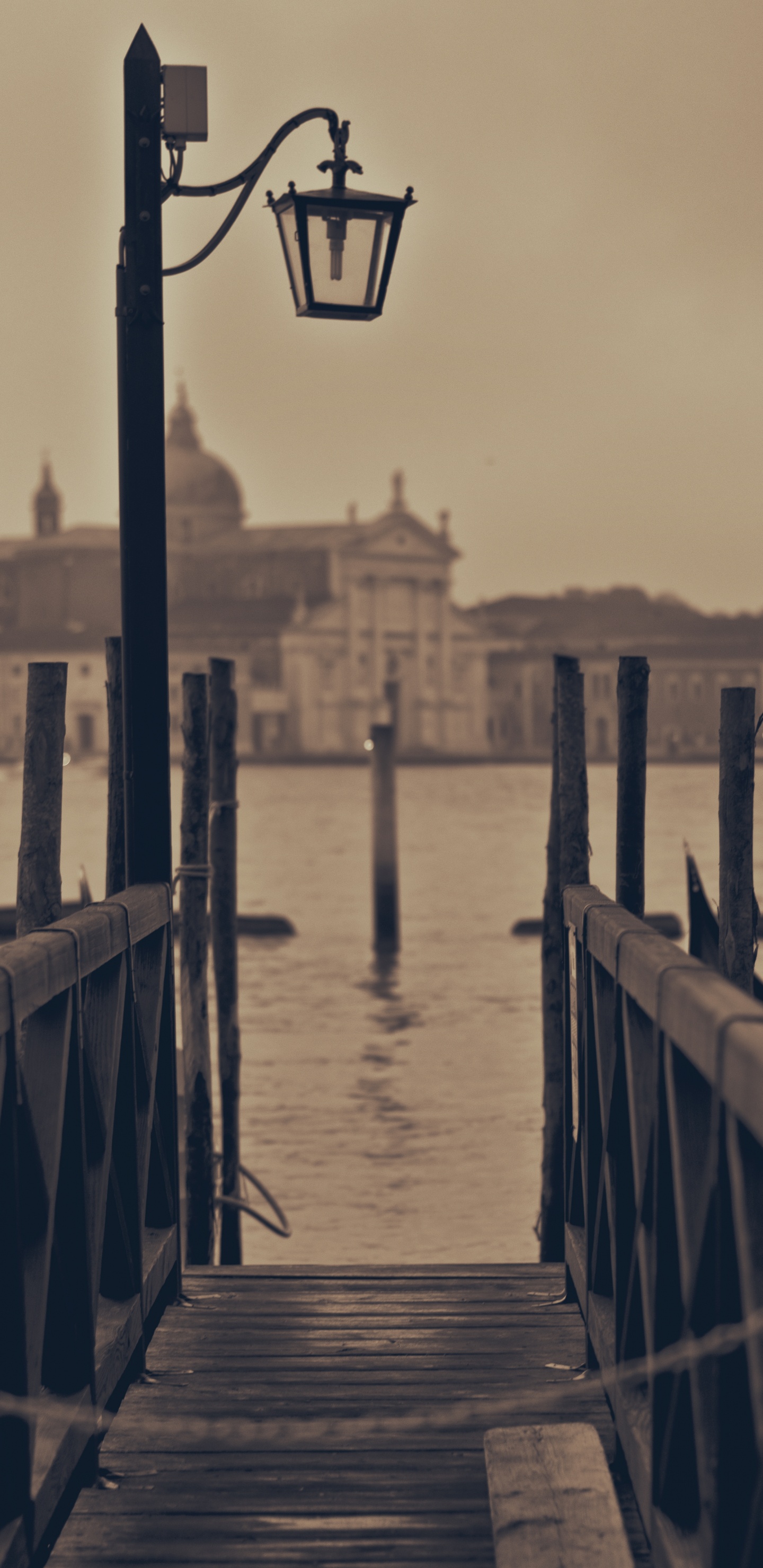 Brown Wooden Dock on Body of Water During Daytime. Wallpaper in 1440x2960 Resolution