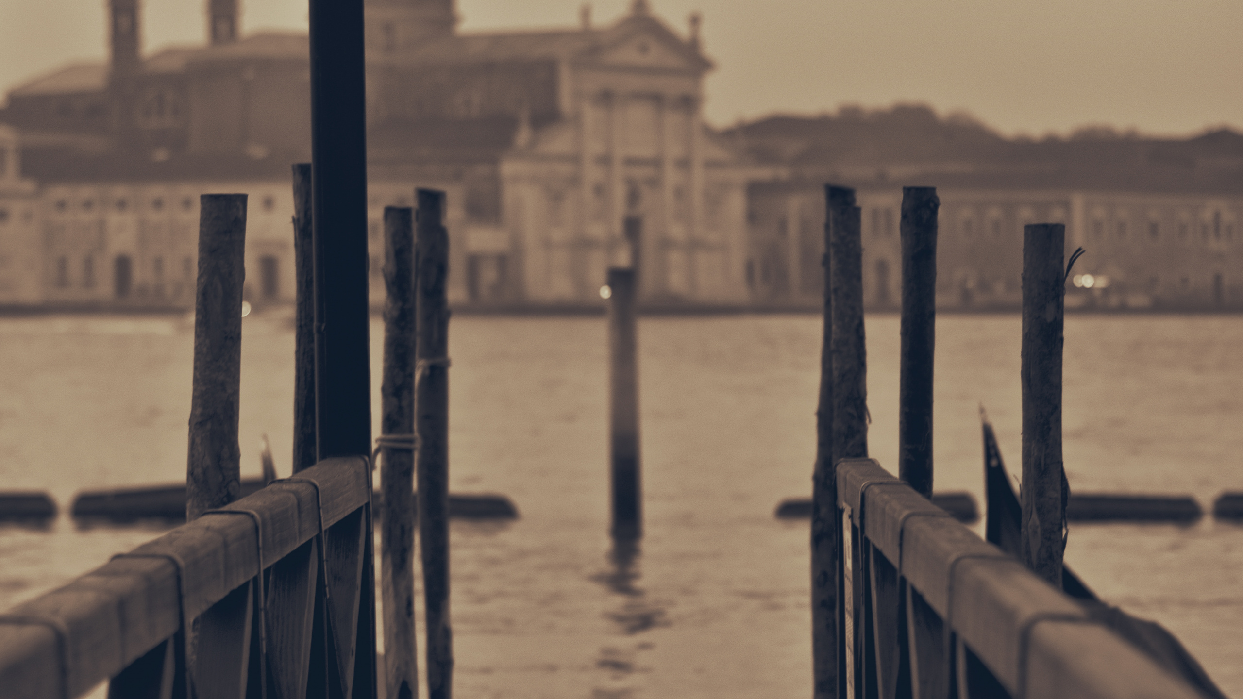 Brown Wooden Dock on Body of Water During Daytime. Wallpaper in 2560x1440 Resolution