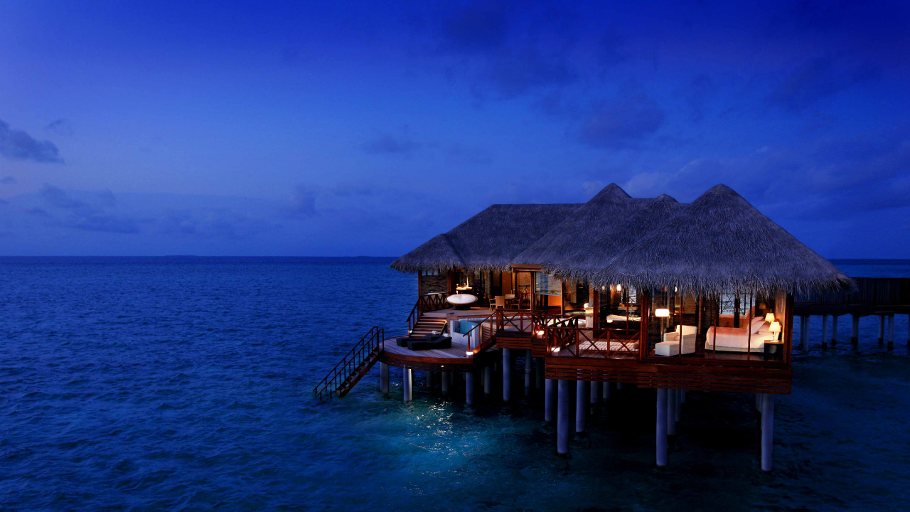 Brown Wooden Dock on Blue Sea Under Blue Sky During Daytime. Wallpaper in 1280x720 Resolution