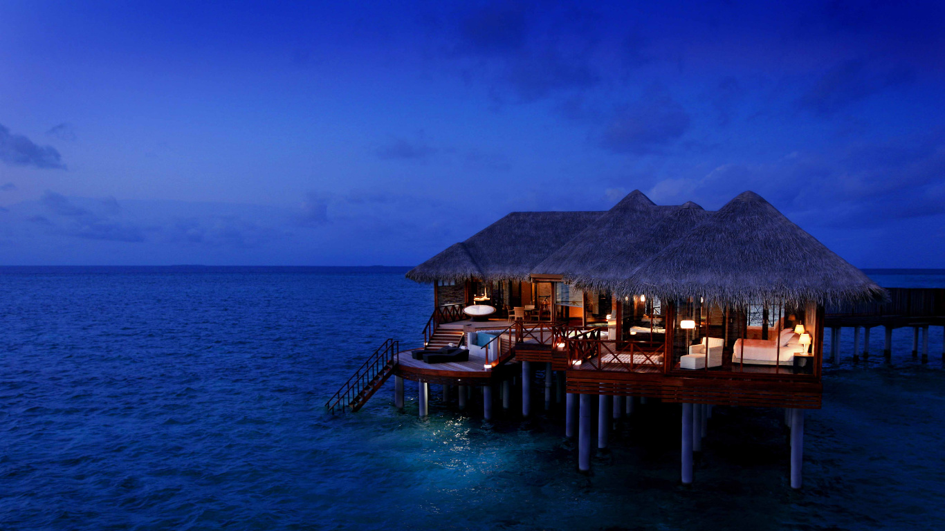 Brown Wooden Dock on Blue Sea Under Blue Sky During Daytime. Wallpaper in 1366x768 Resolution