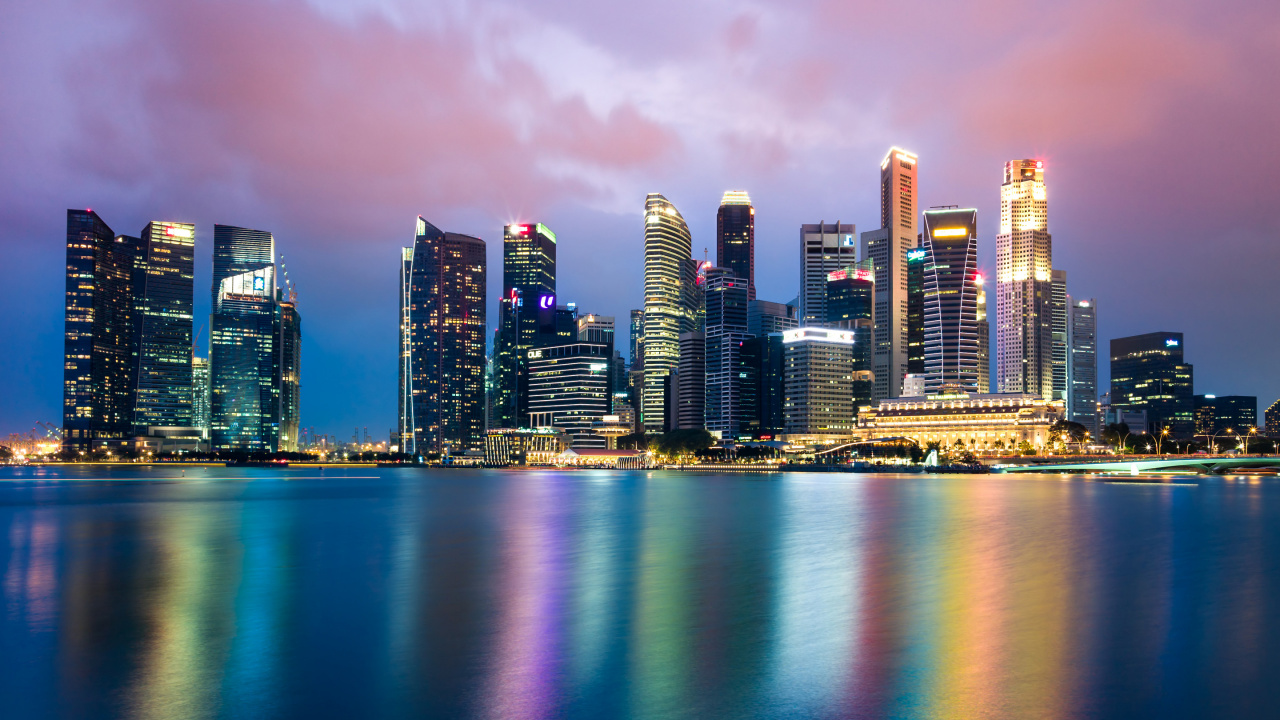 City Skyline Across Body of Water During Night Time. Wallpaper in 1280x720 Resolution