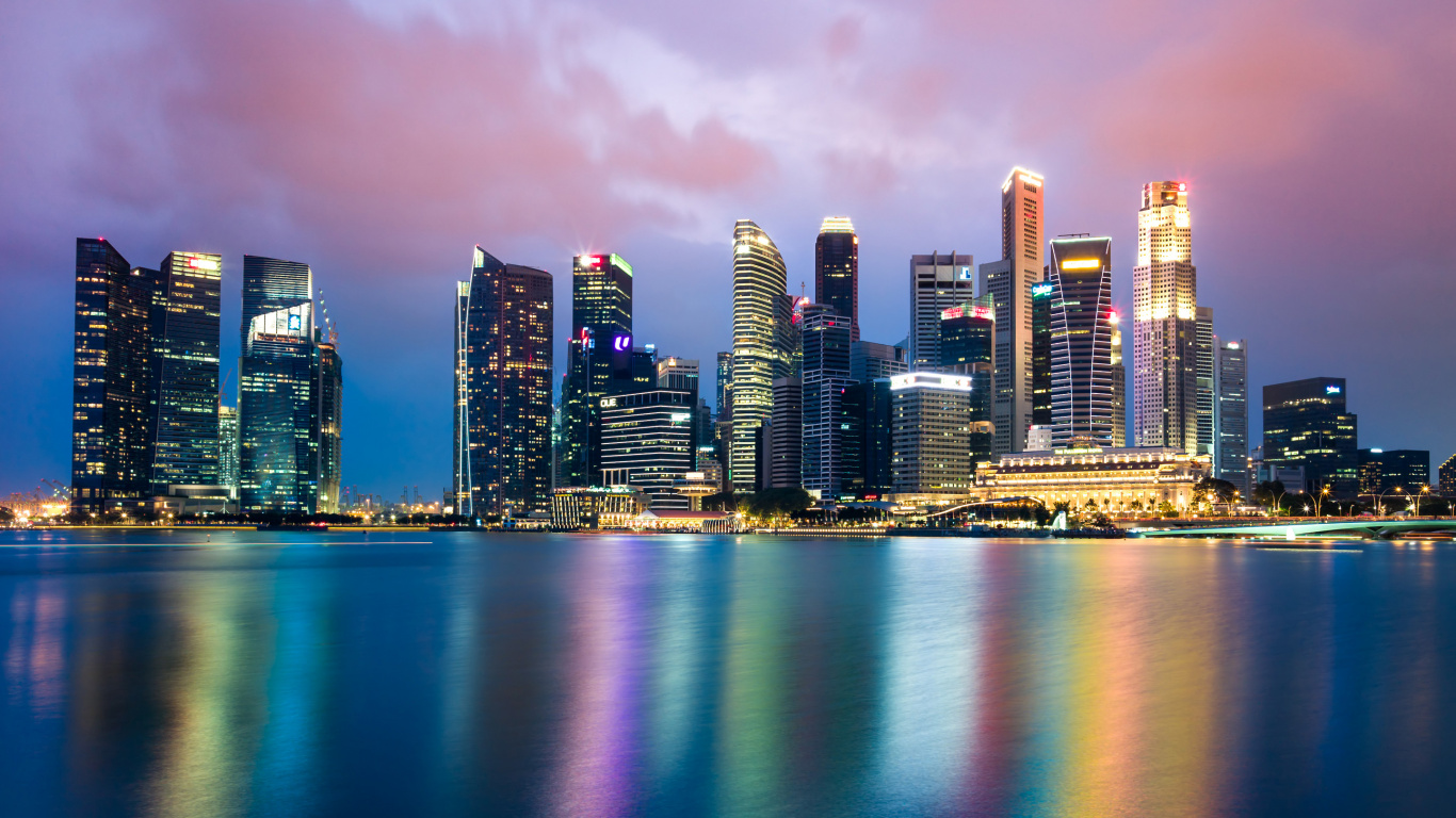 City Skyline Across Body of Water During Night Time. Wallpaper in 1366x768 Resolution