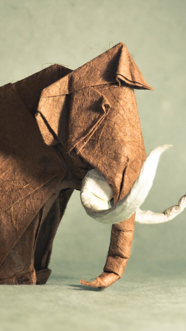 Brown and White Elephant Figurine. Wallpaper in 720x1280 Resolution