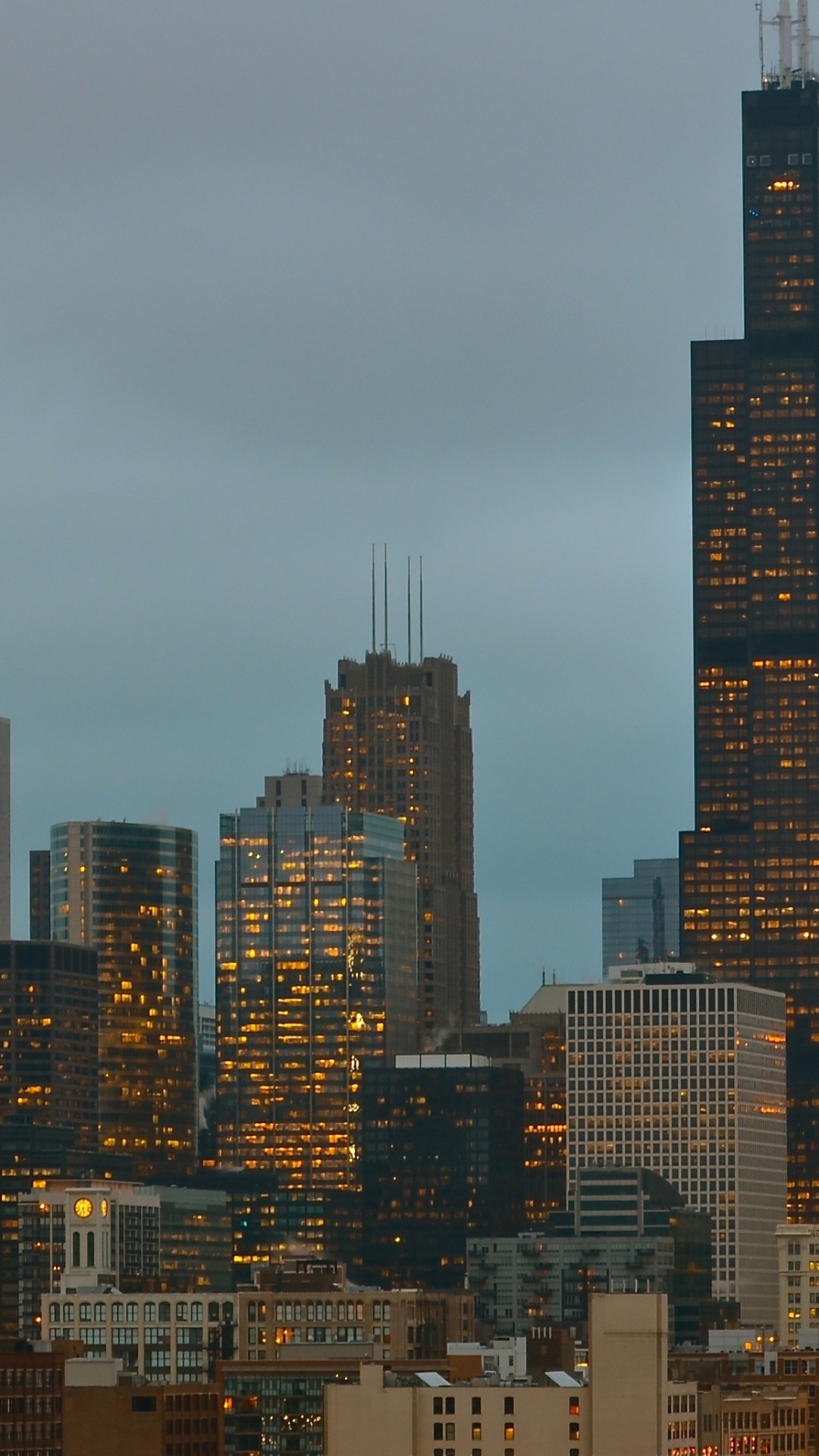 City Skyline Under Gray Sky During Daytime. Wallpaper in 1080x1920 Resolution