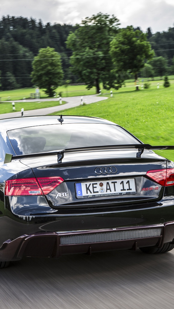 Schwarzer Audi r 8 Tagsüber Unterwegs. Wallpaper in 720x1280 Resolution