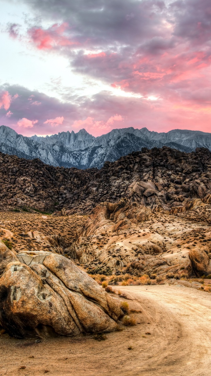 Brown and Black Rock Formation Under White Clouds. Wallpaper in 720x1280 Resolution