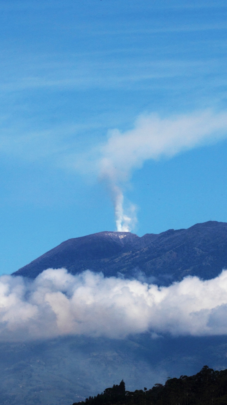 Green Mountain Under Blue Sky During Daytime. Wallpaper in 750x1334 Resolution