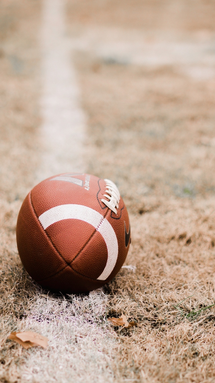 Brown Basketball on Brown Field During Daytime. Wallpaper in 720x1280 Resolution