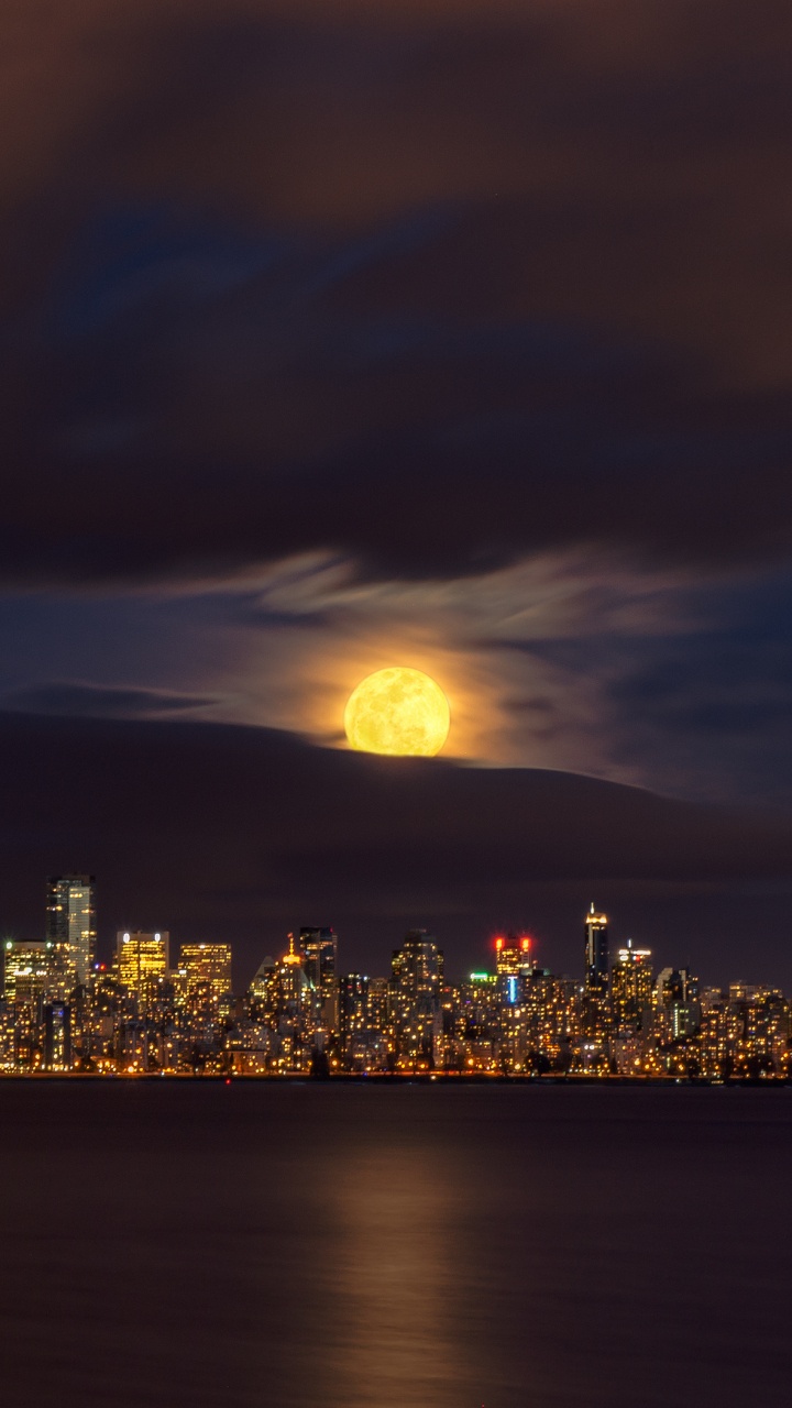 City Skyline During Night Time. Wallpaper in 720x1280 Resolution