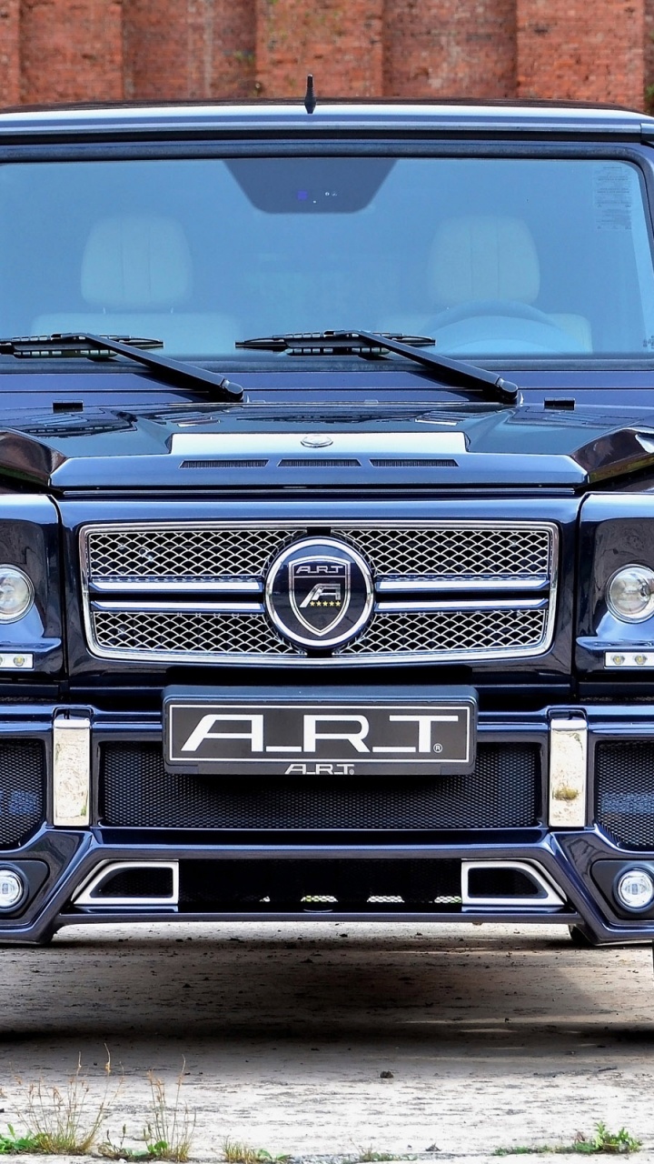 Blauer Jeep Wrangler Tagsüber Unterwegs. Wallpaper in 720x1280 Resolution