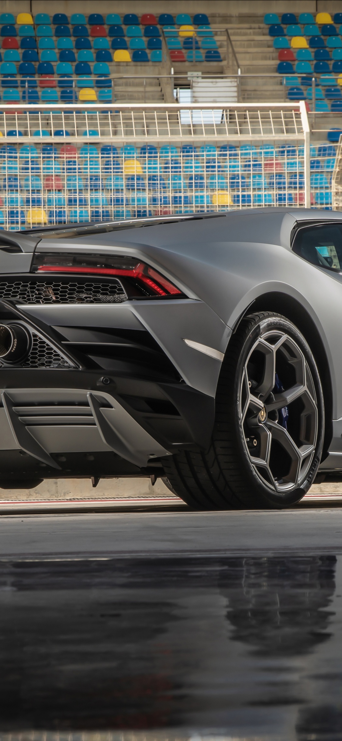 Black Porsche 911 on Road During Daytime. Wallpaper in 1125x2436 Resolution
