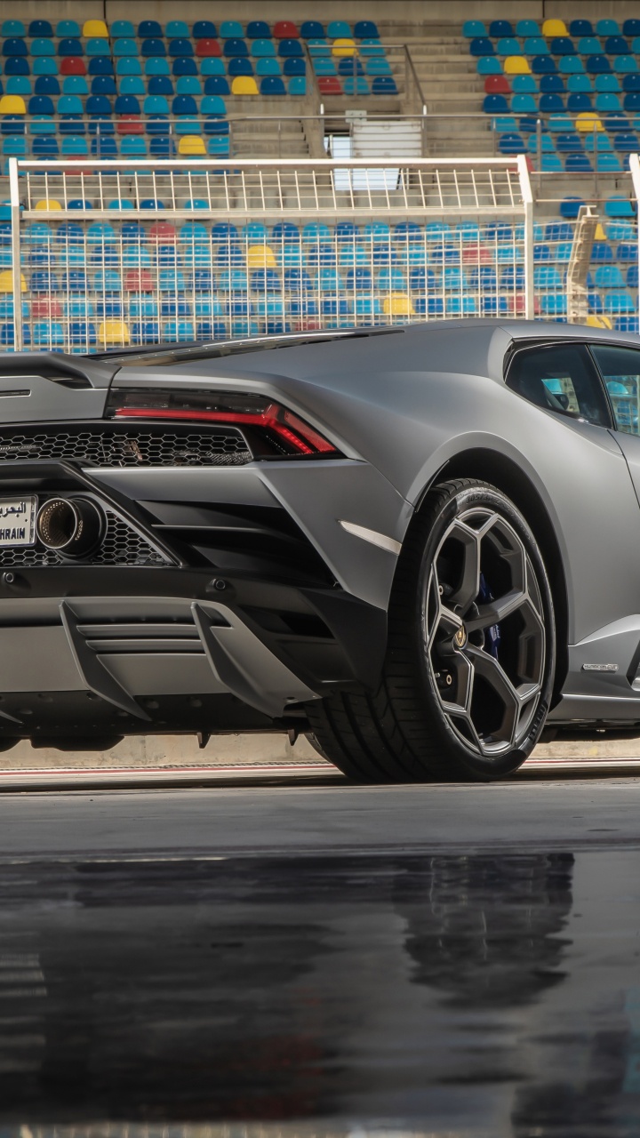 Porsche 911 Noire Sur Route Pendant la Journée. Wallpaper in 720x1280 Resolution