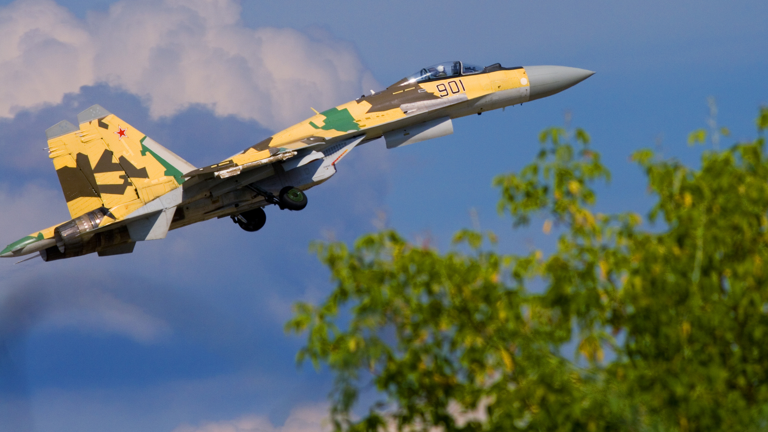 Yellow and White Jet Plane Flying in The Sky During Daytime. Wallpaper in 2560x1440 Resolution