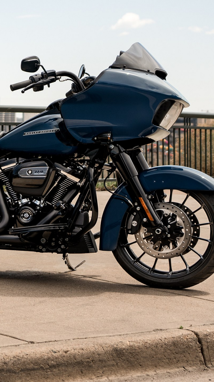 Blue and Black Cruiser Motorcycle on Gray Concrete Road During Daytime. Wallpaper in 750x1334 Resolution