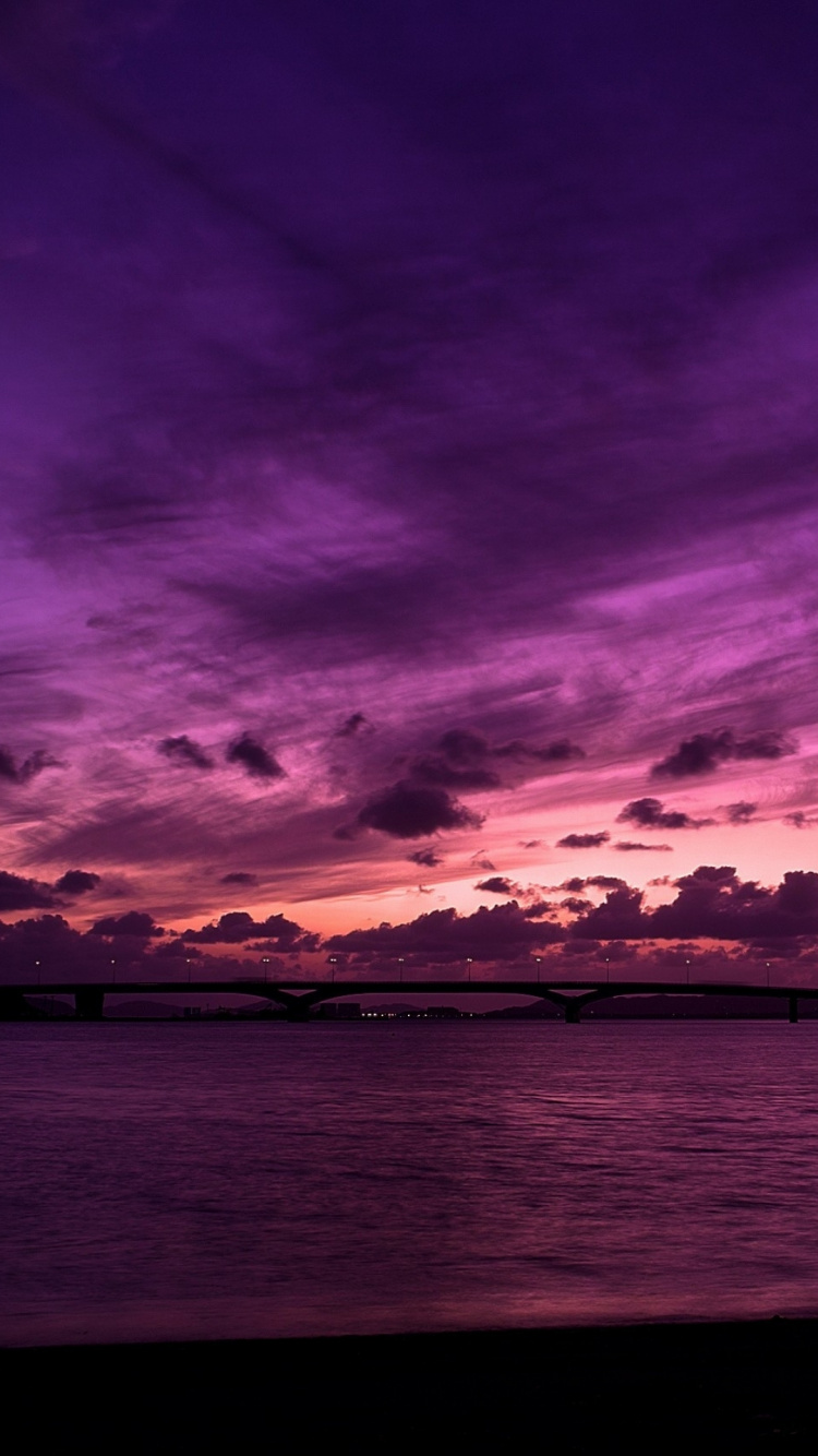 Body of Water Under Blue Sky During Sunset. Wallpaper in 750x1334 Resolution