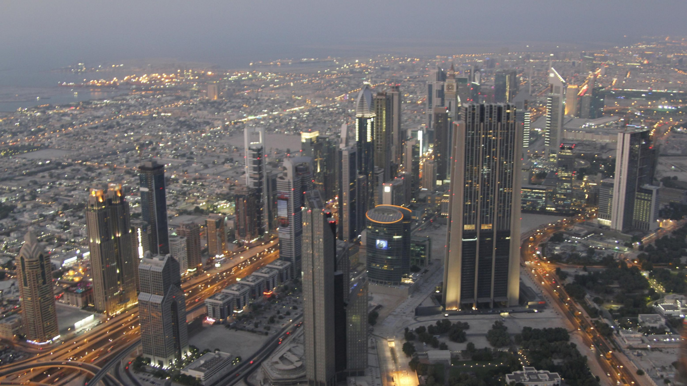 City Buildings During Night Time. Wallpaper in 1366x768 Resolution