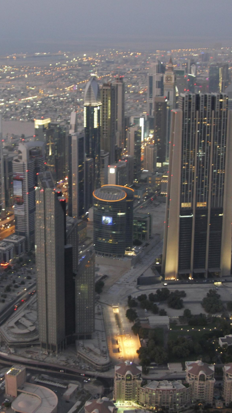 City Buildings During Night Time. Wallpaper in 750x1334 Resolution