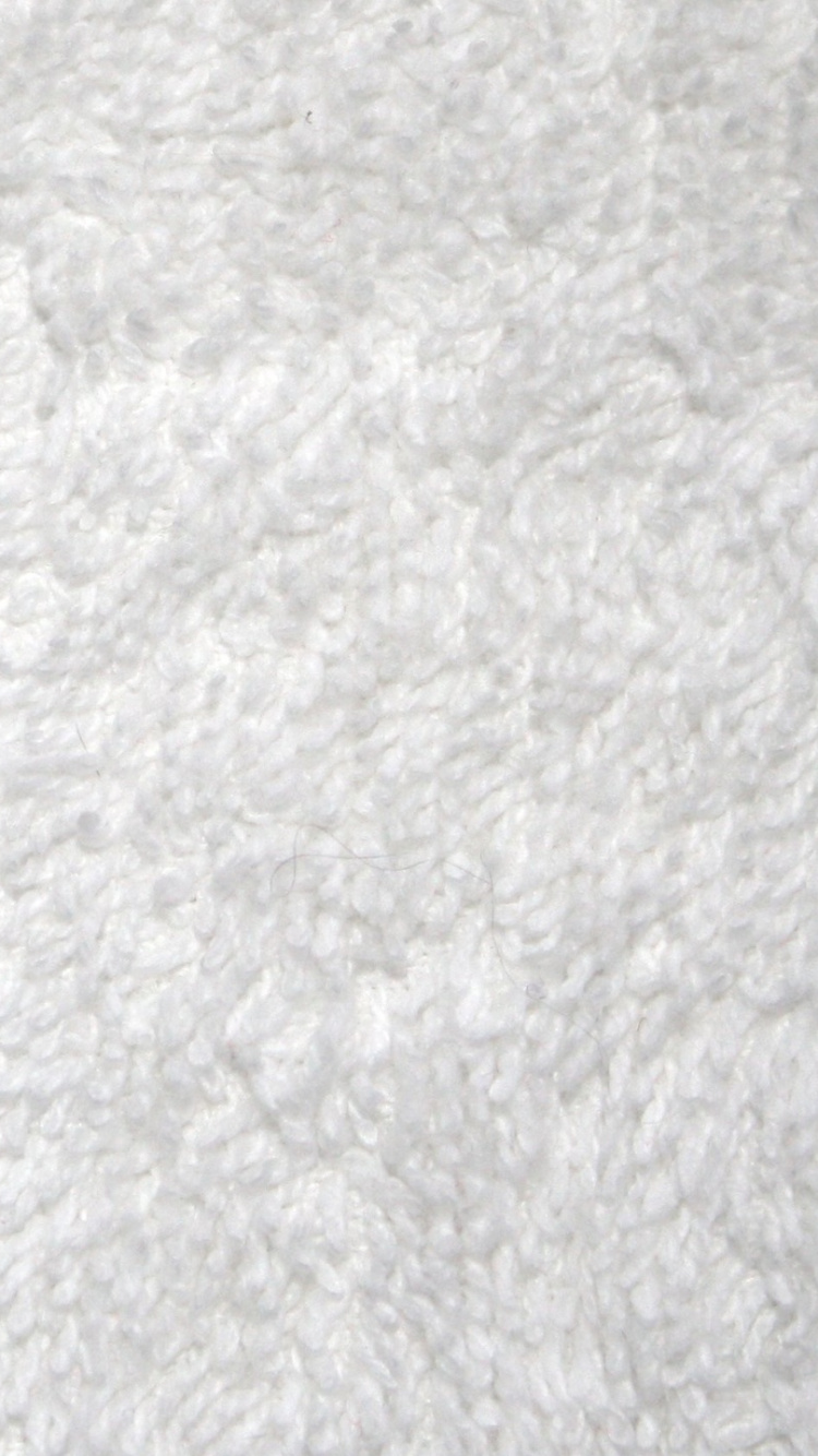 Textil Blanco Sobre Mesa de Madera Marrón. Wallpaper in 750x1334 Resolution