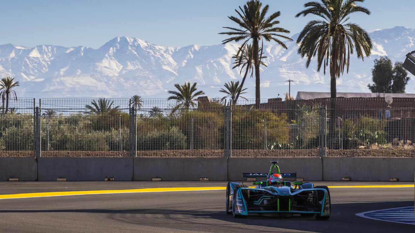 Blue and Black f 1 Car on Road During Daytime. Wallpaper in 1366x768 Resolution