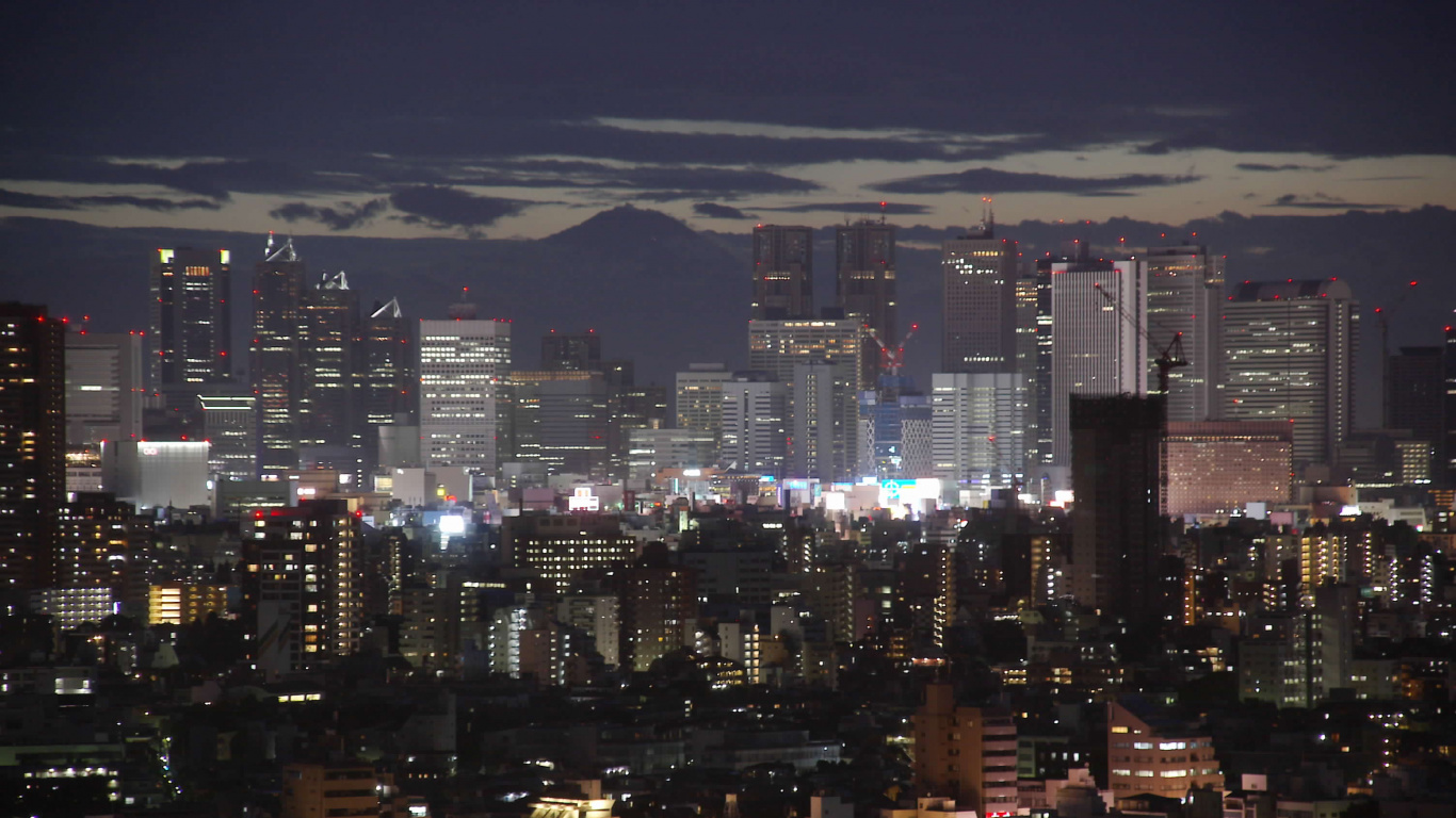 Aerial View of City Buildings During Night Time. Wallpaper in 1366x768 Resolution