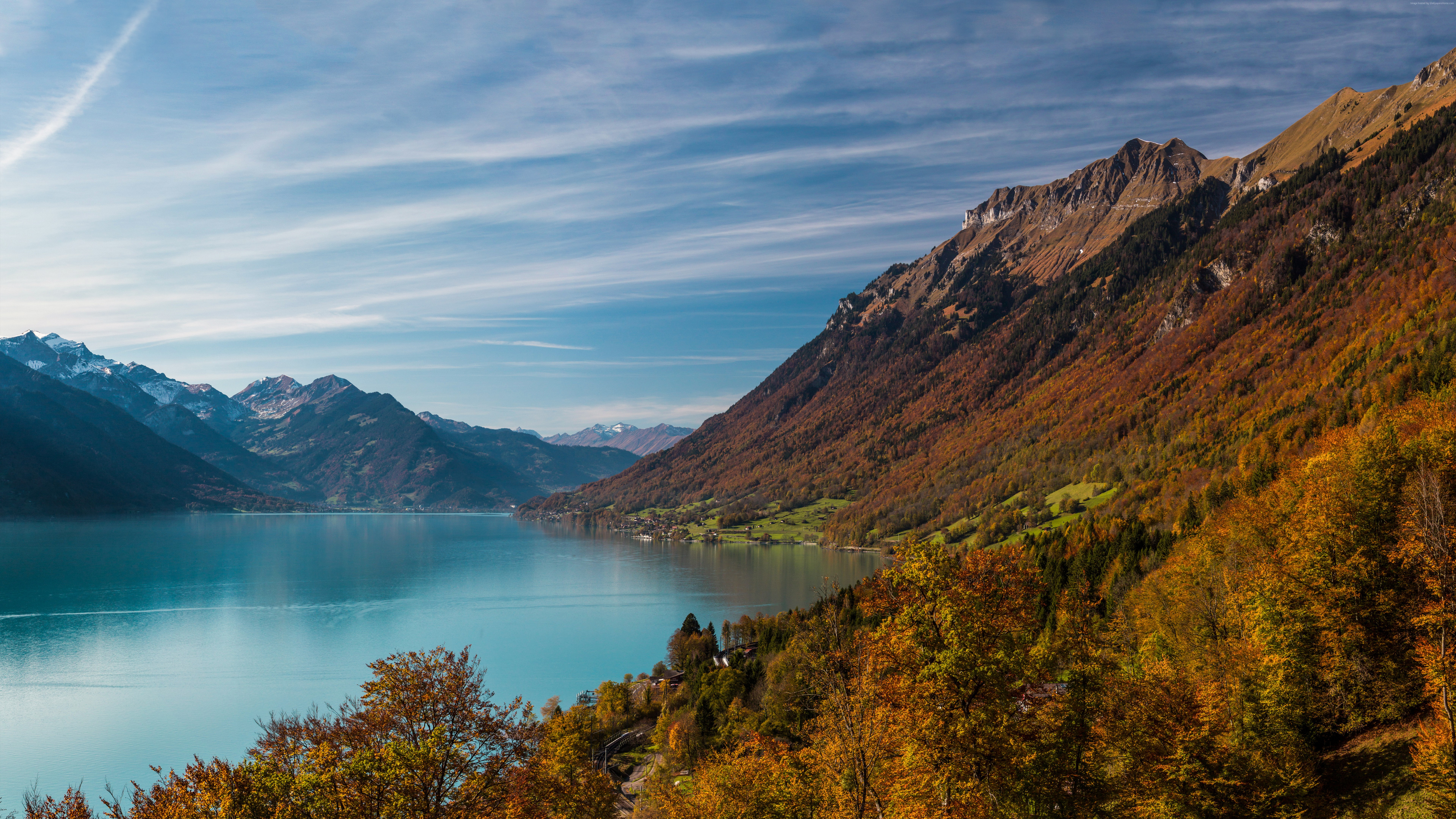 Green and Brown Mountain Beside Lake Under Blue Sky During Daytime. Wallpaper in 3840x2160 Resolution
