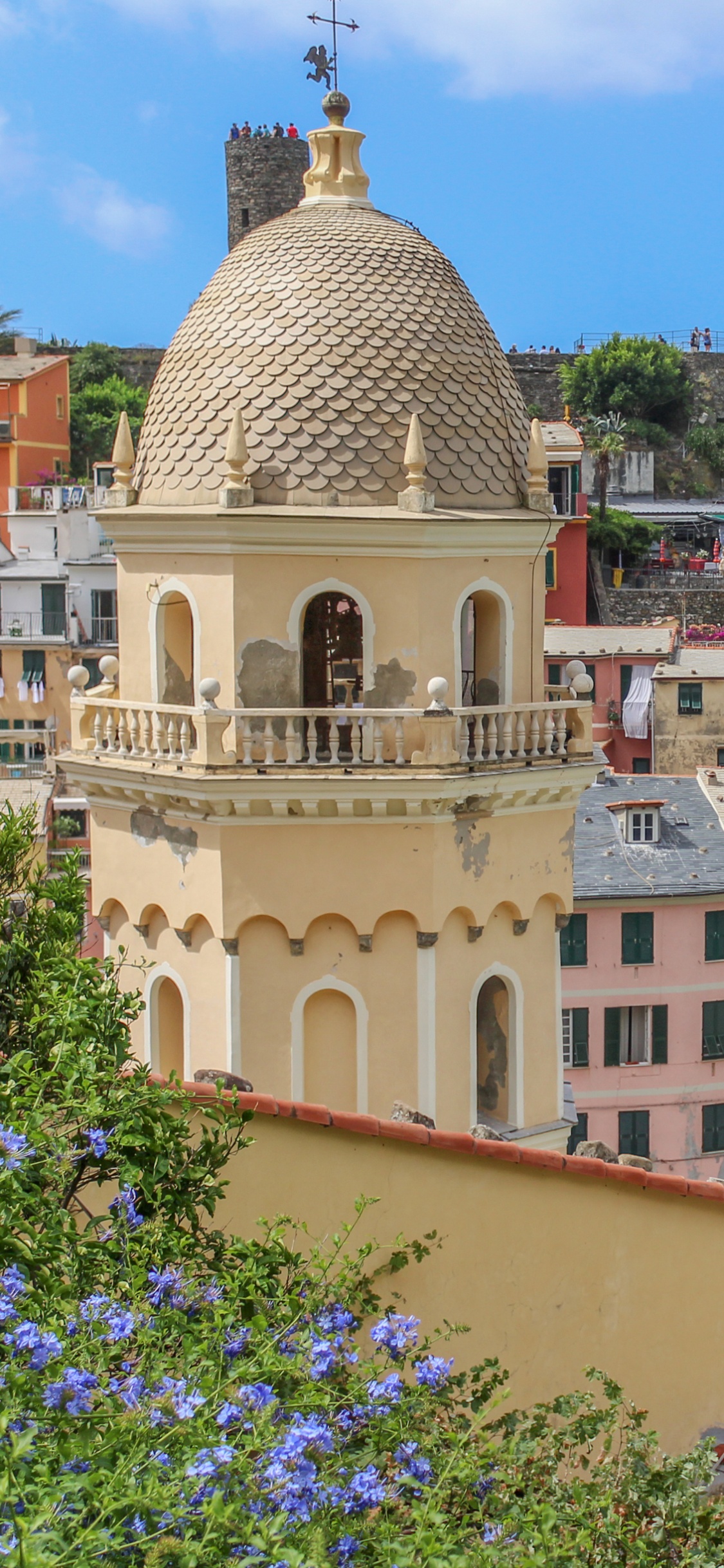 Brown and White Concrete Building Near Body of Water During Daytime. Wallpaper in 1125x2436 Resolution