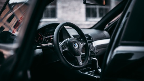 Image black mercedes benz steering wheel