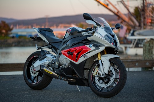 Image red and black sports bike on road during daytime