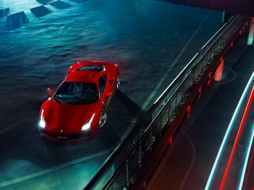 Image red ferrari sports car on bridge