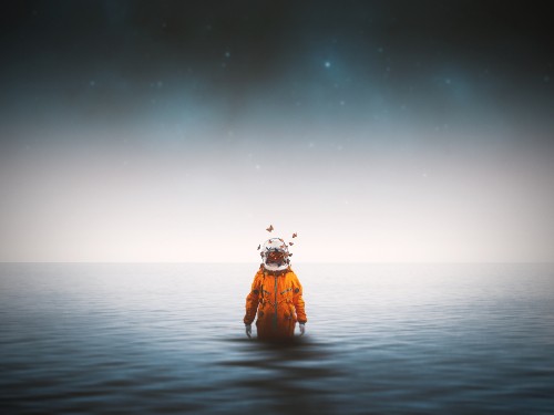 Image person in orange jacket standing on water under starry night