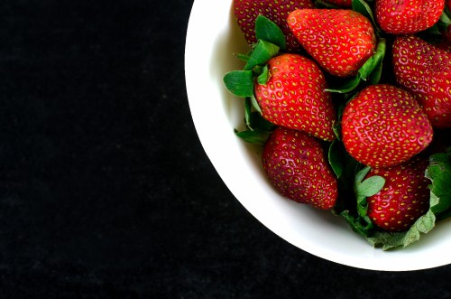 Image strawberries on white ceramic bowl