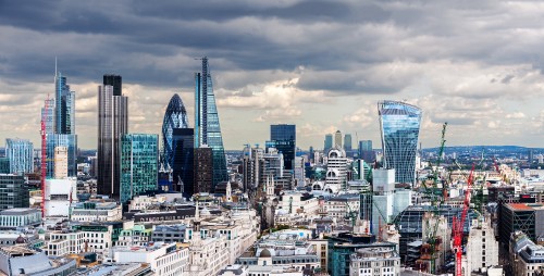 Image city skyline under cloudy sky during daytime