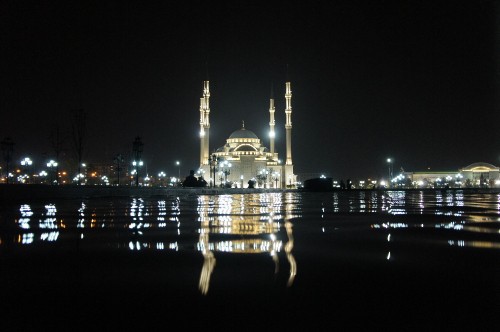 Image white and blue dome building during night time