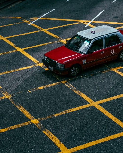 Image red and white car on road