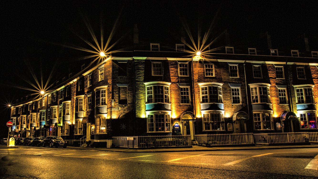 brown concrete building during night time