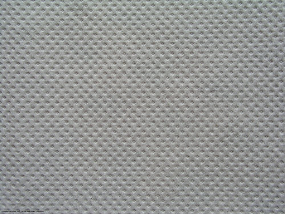 gray and white polka dot textile