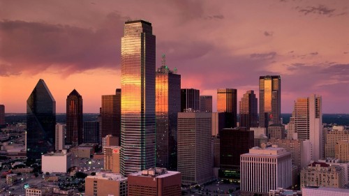 Image high rise buildings during night time