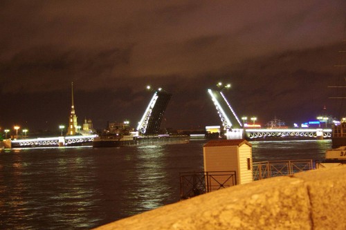 Image brown and white ship on sea during night time