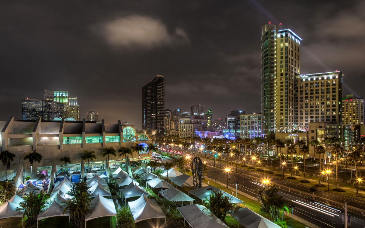 city with high rise buildings during night time