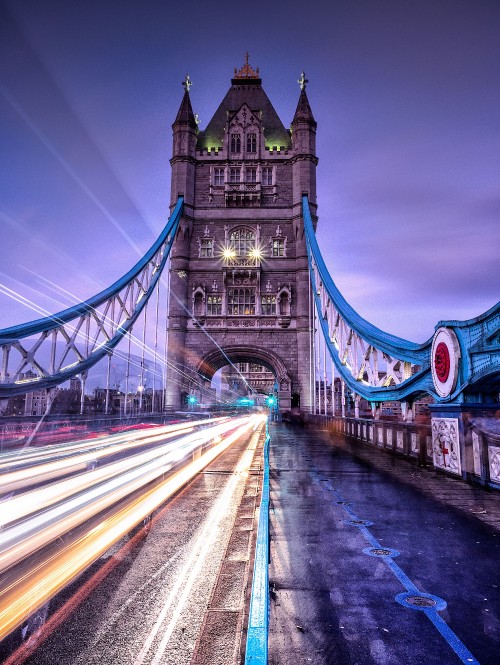 Image time lapse photography of bridge during night time