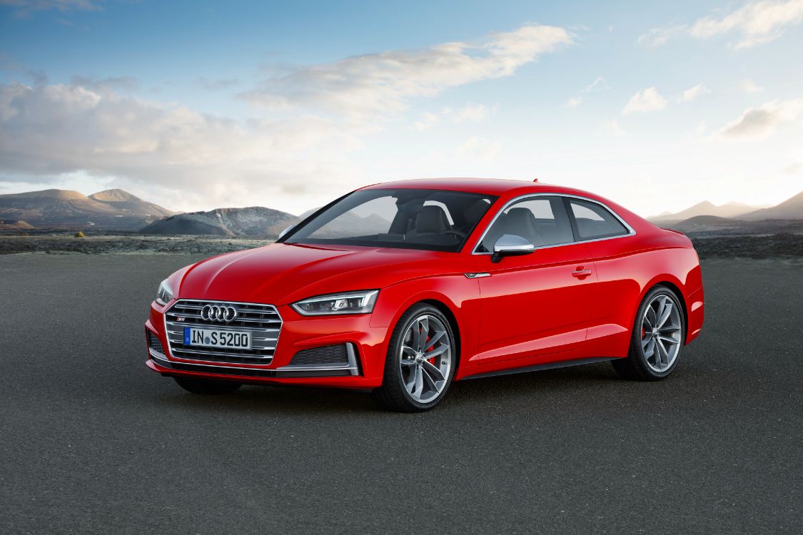 Audi A 4 Sedán Rojo Sobre Una Carretera de Asfalto Gris. Wallpaper in 4096x2730 Resolution