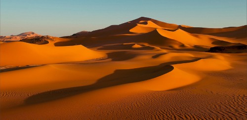 Image brown sand dunes during daytime