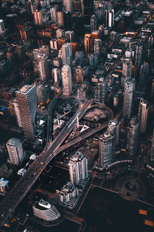 Image aerial view of city buildings during night time