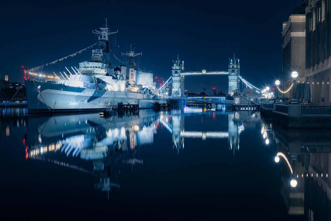 white ship on dock during night time