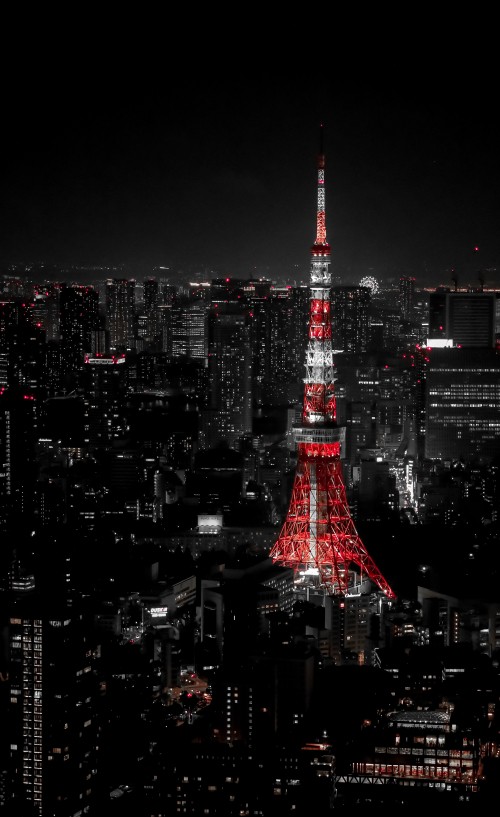 Image red and white tower during night time