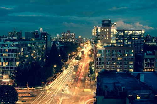 Image time lapse photography of cars on road during night time