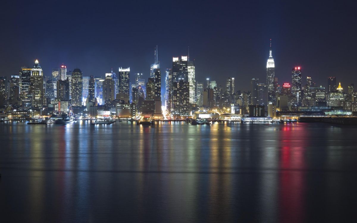 city skyline during night time