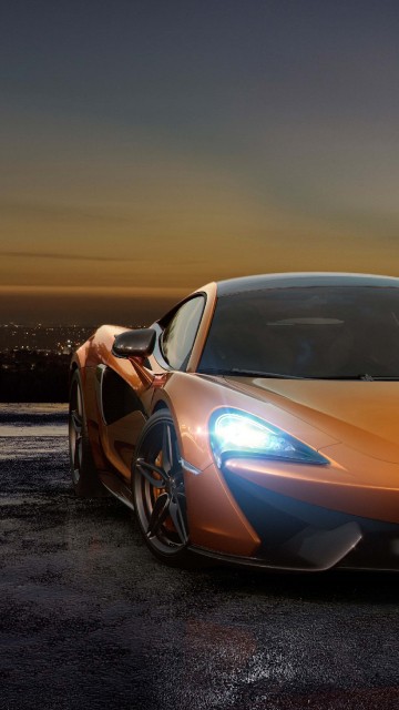 Image yellow lamborghini aventador on the beach during night time