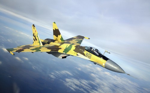 Image yellow and black fighter jet flying in the sky